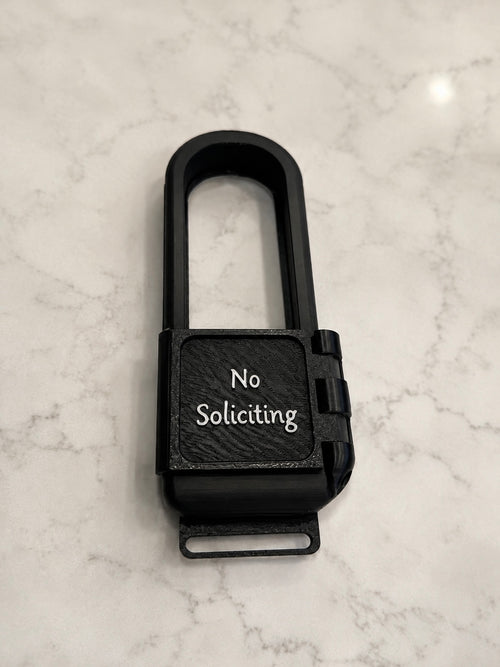 Top-down flat lay of the AvrenForge No Soliciting cover